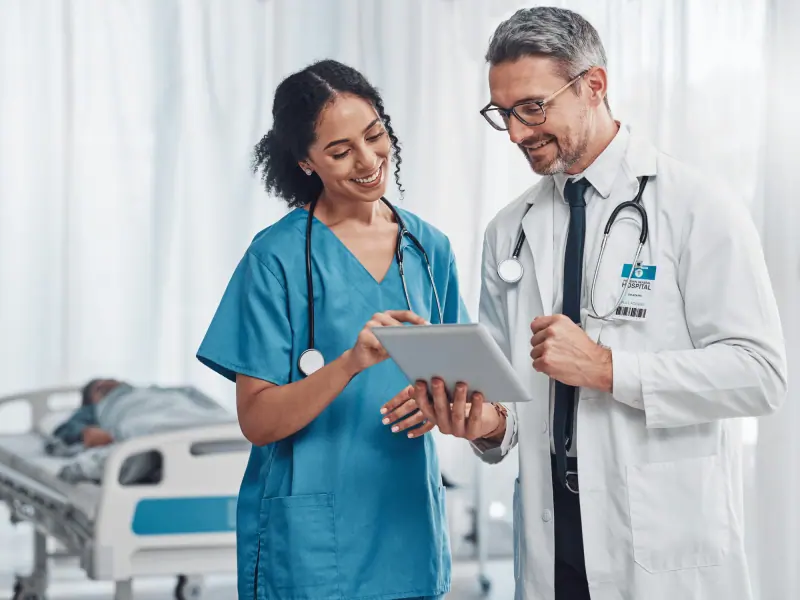 Clinician working with healthcare technology